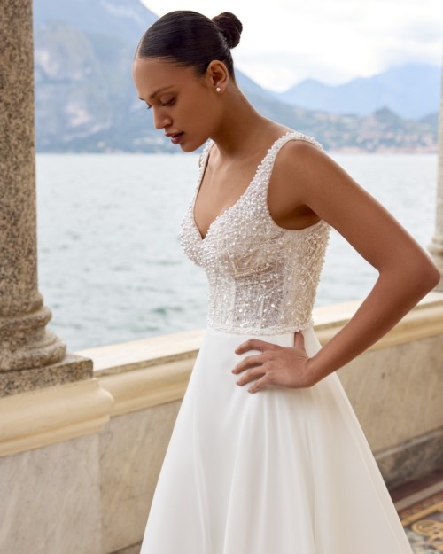 Beaded A-Line Gown with V-Neckline and Flowing Chiffon Skirt