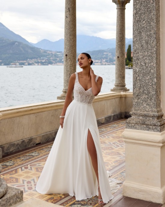 Beaded A-Line Gown with V-Neckline and Flowing Chiffon Skirt